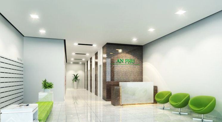 Sảnh tiếp tân của chung cư An Phú với quầy lễ tân đá và ghế chờ xanh